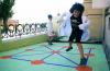 Escuela Chile: niños jugando en zig zag
